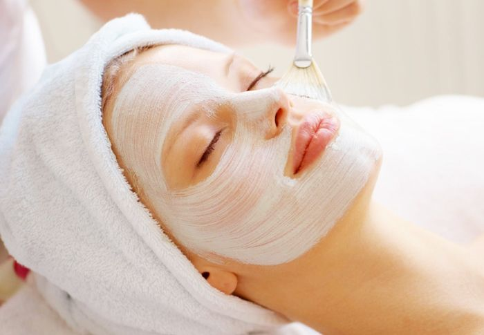 Professional facial treatment for healthy glowing skin at PalmLeaf Massage & Wellness